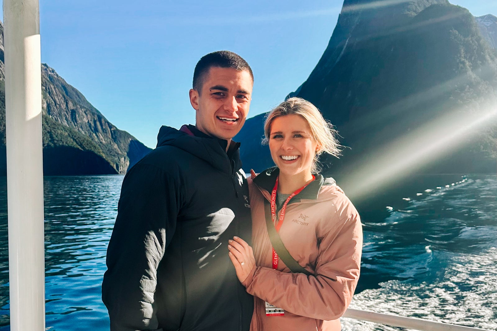 Young couple on boat in Milford Sound
