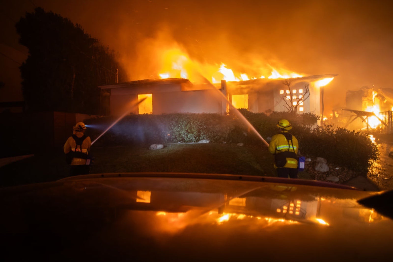 firefighters battle Palisades fire in Los Angeles.