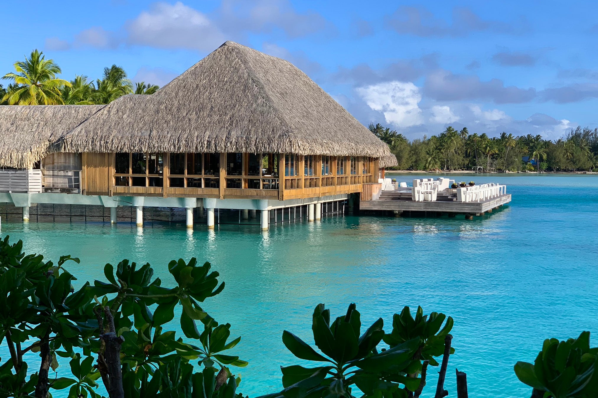 an overwater bungalow at a fancy hotel