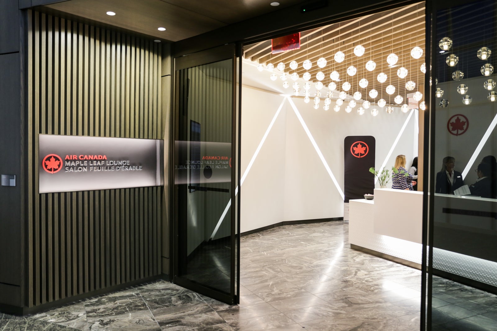 the entrance to an Air Canada airport lounge