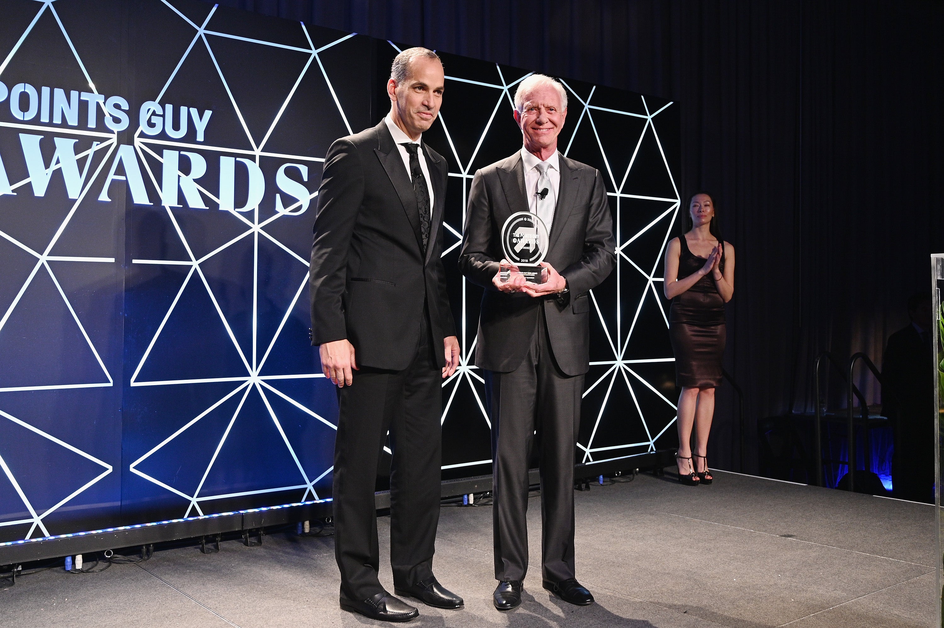 Ric Elias and Honoree Captain Chesley "Sully" Sullenberger onstage during The Points Guy Awards in 2018.