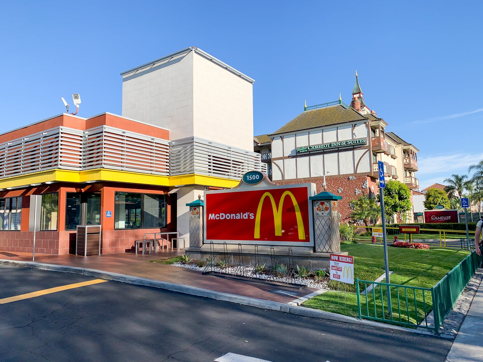 An exterior shot of a McDonald's under a blue sky 