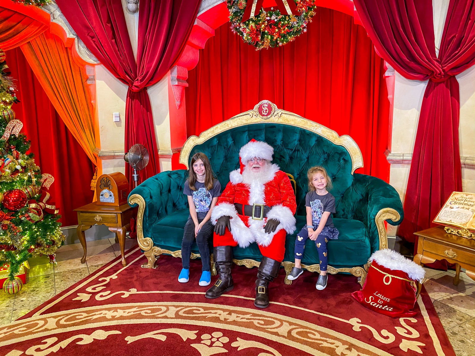 kids sitting with santa