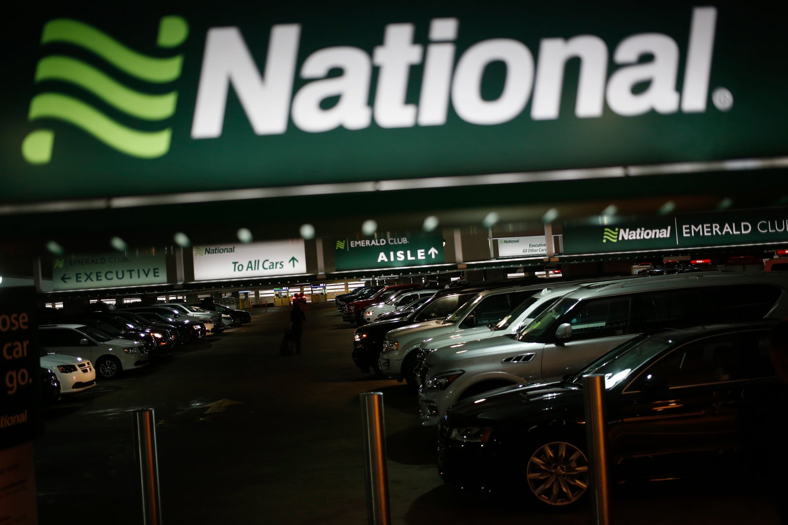 National sign over cars in parking garage