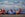 Multiple Southwest Airlines planes on the tarmac with snow-capped mountains in the background