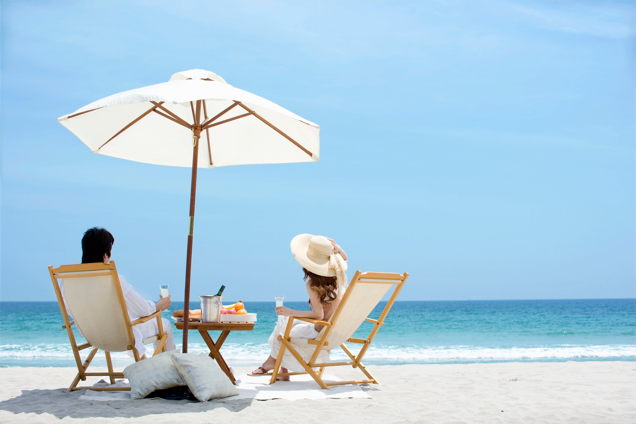 Ask your beach concierge to set up a Champagne toast.