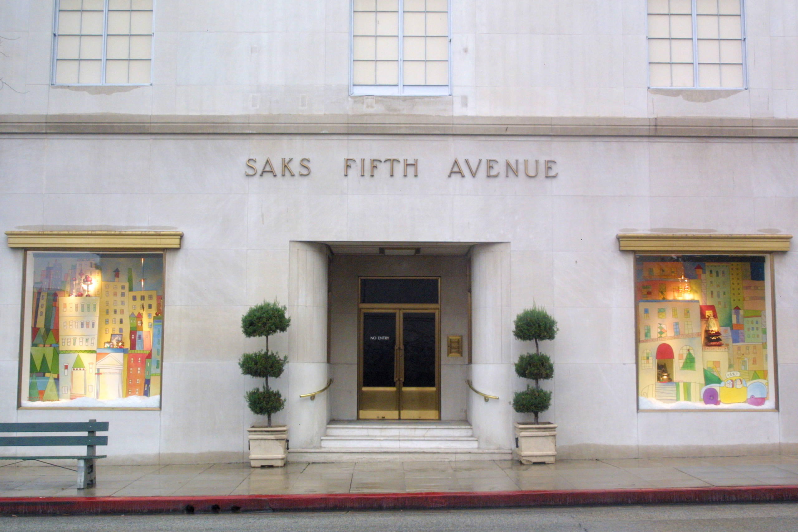 the front of a Saks Fifth Avenue store as seen from across the street