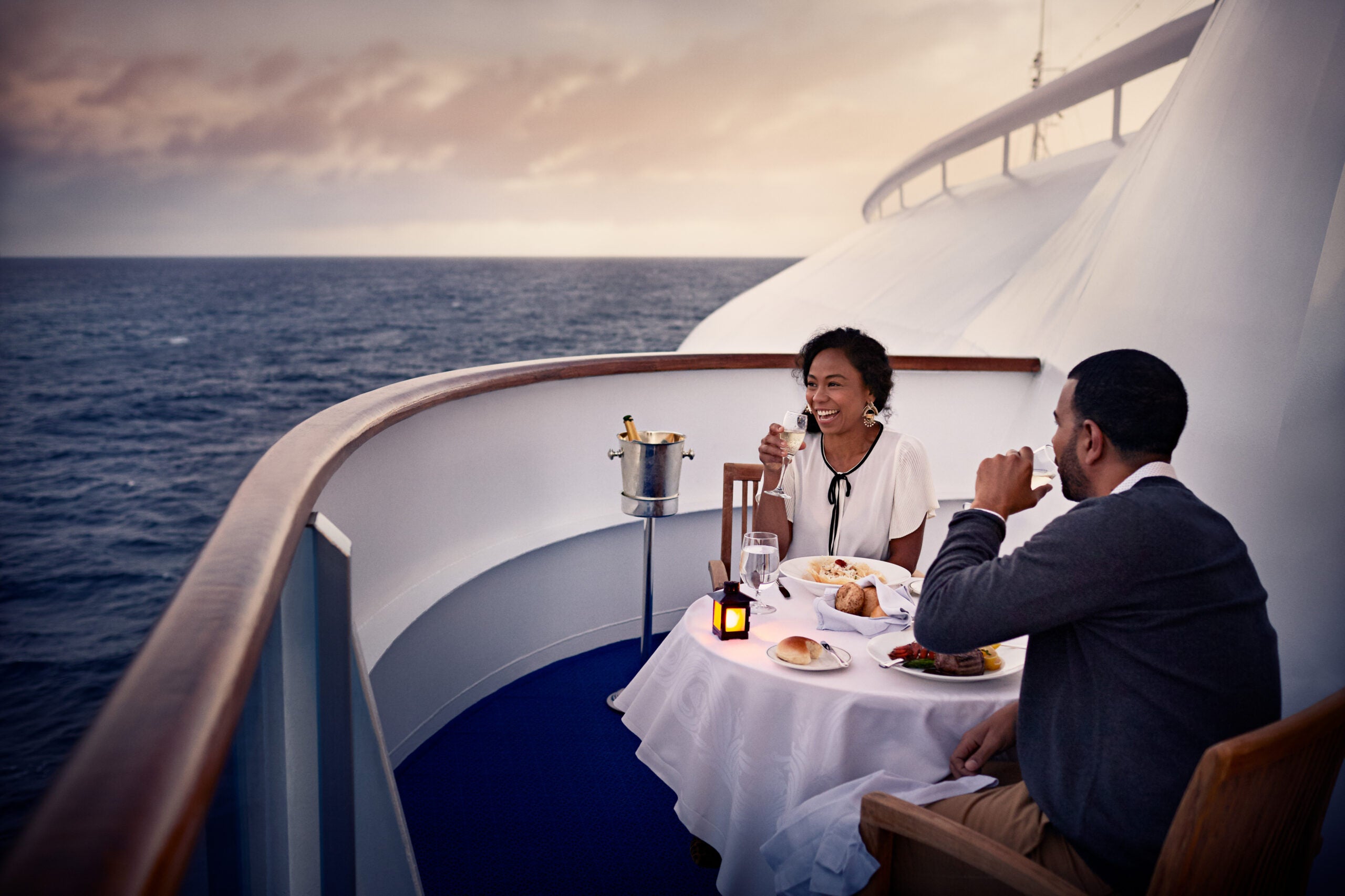 Couple dining on their Princess cruise ship balcony