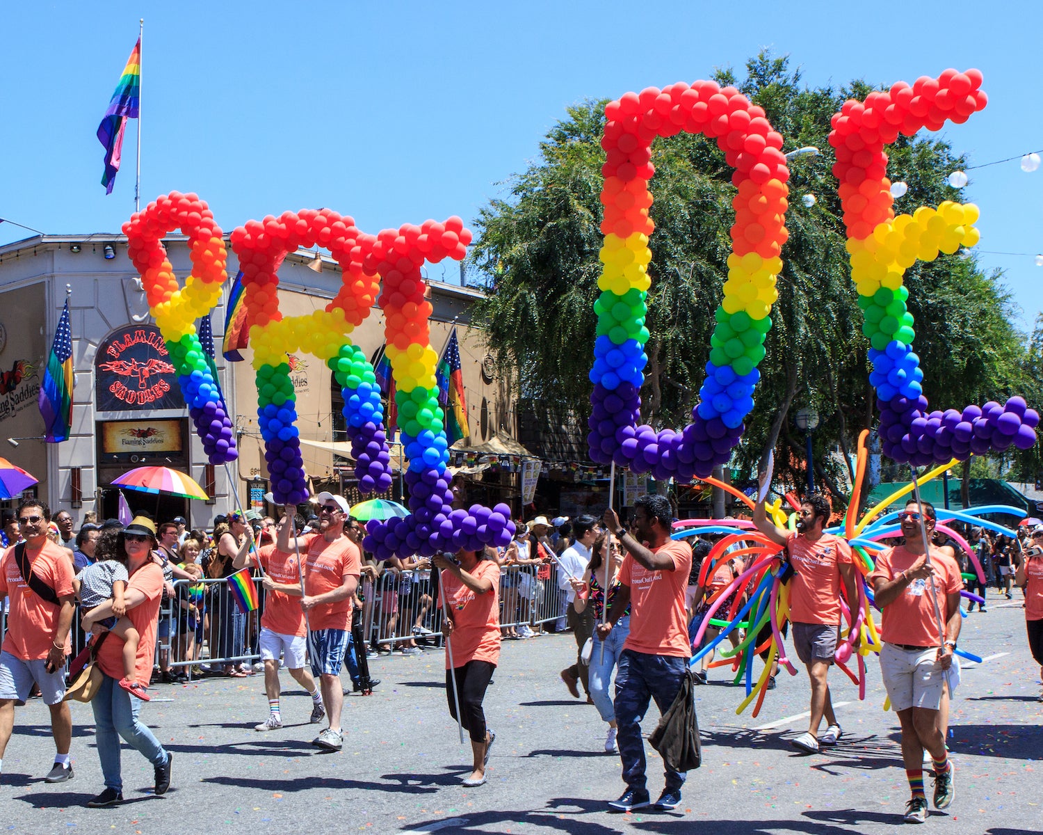 os Angeles Pride Parade with Pride spelled out in balloons