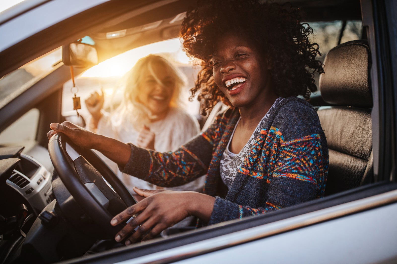 friends drive a car together