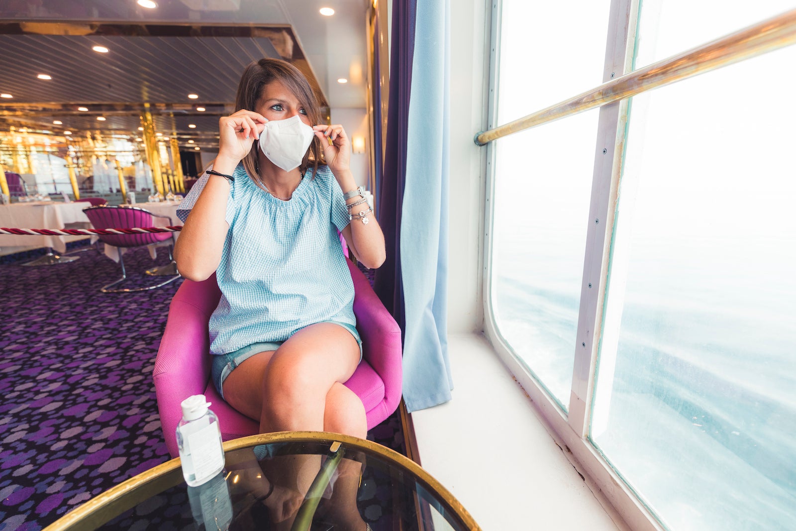 woman wearing mask on cruise