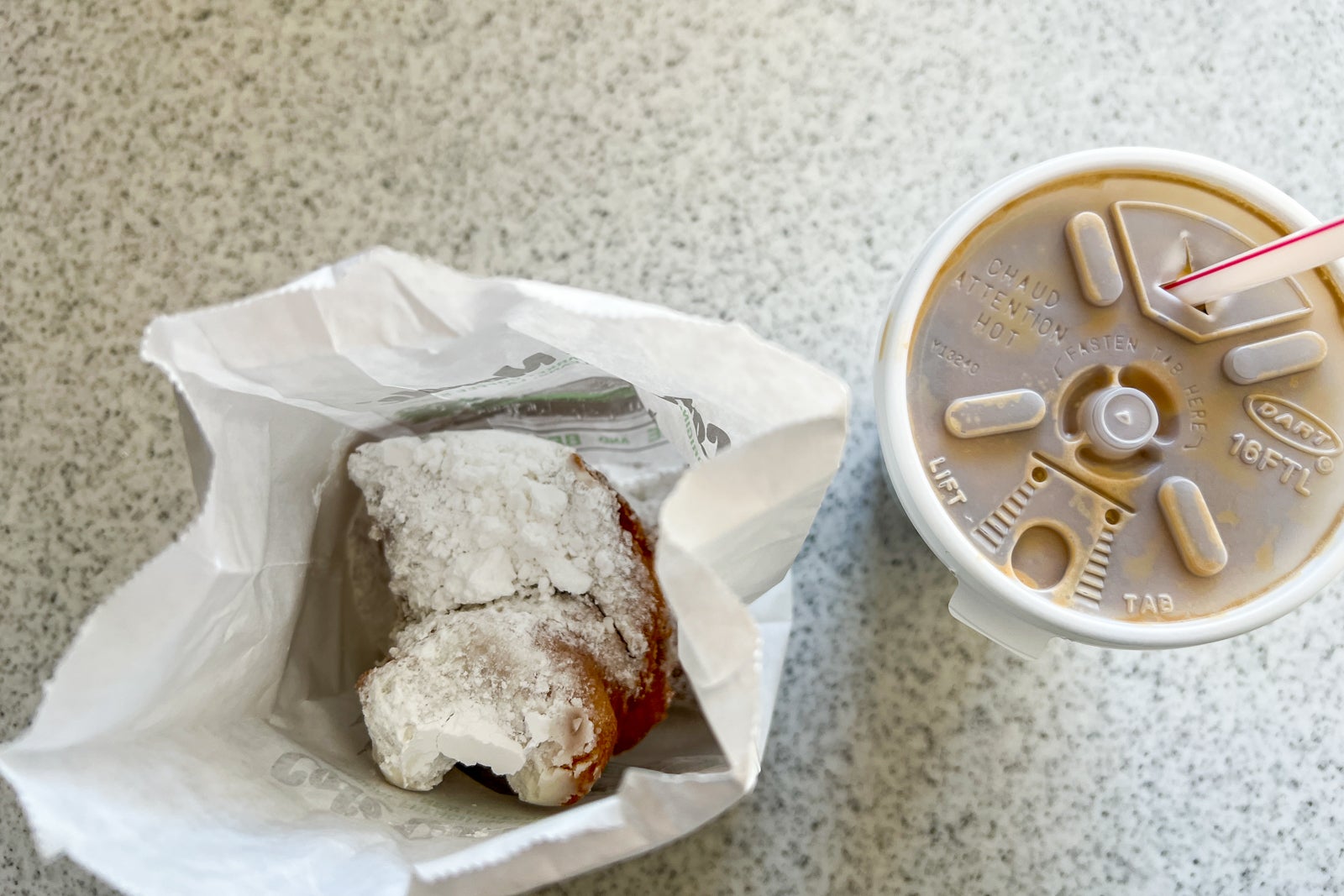 Beignet and coffee.