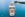 Aerial view of the back of a cruise ship docked at a long pier