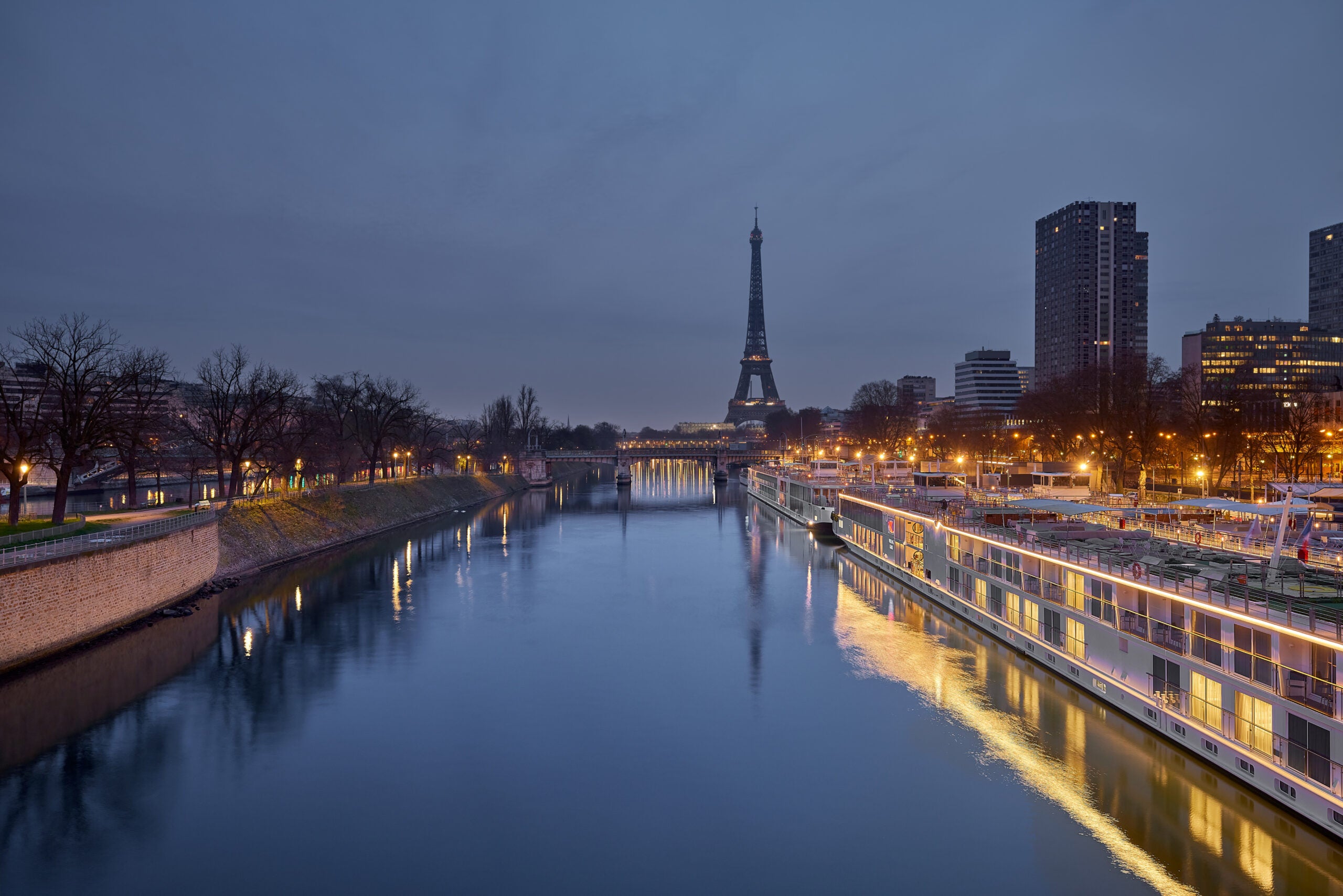 Viking river ships docked in Paris on the Seine with the Eiffel Tower in the background