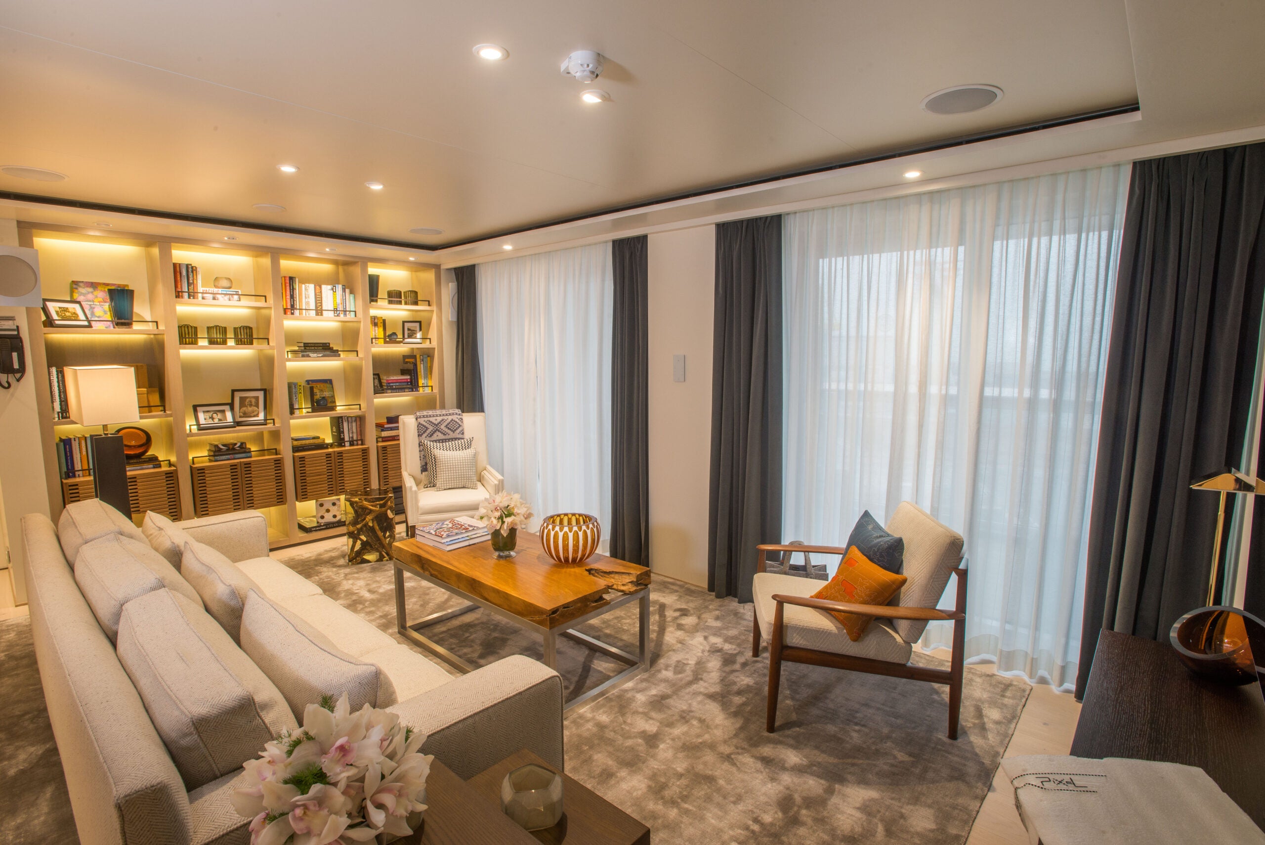 The living room area of a Viking cruise ship owner's suite