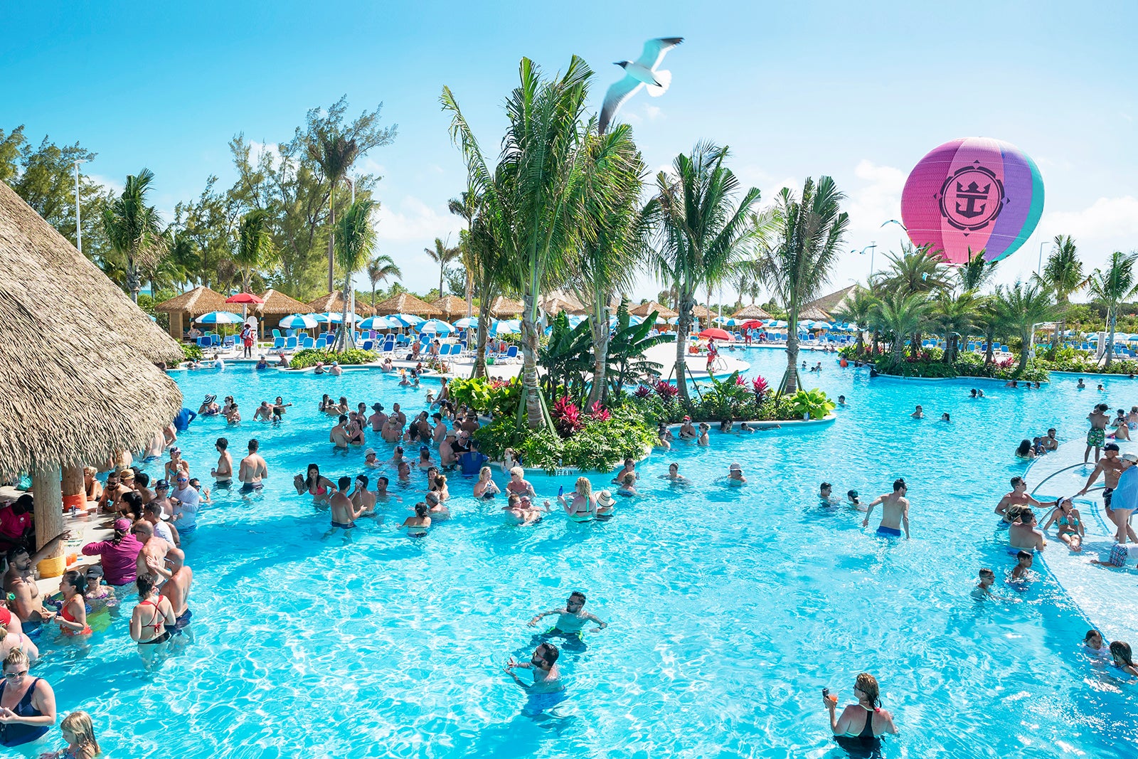 Giant swimming pool with swim-up bar on Royal Caribbean's CocoCay