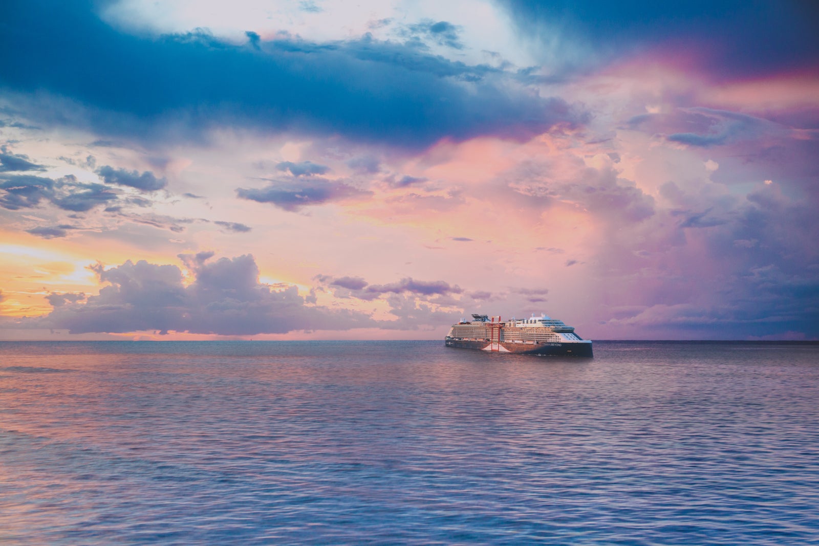 Celebrity Beyond cruise ship at sea at sunrise