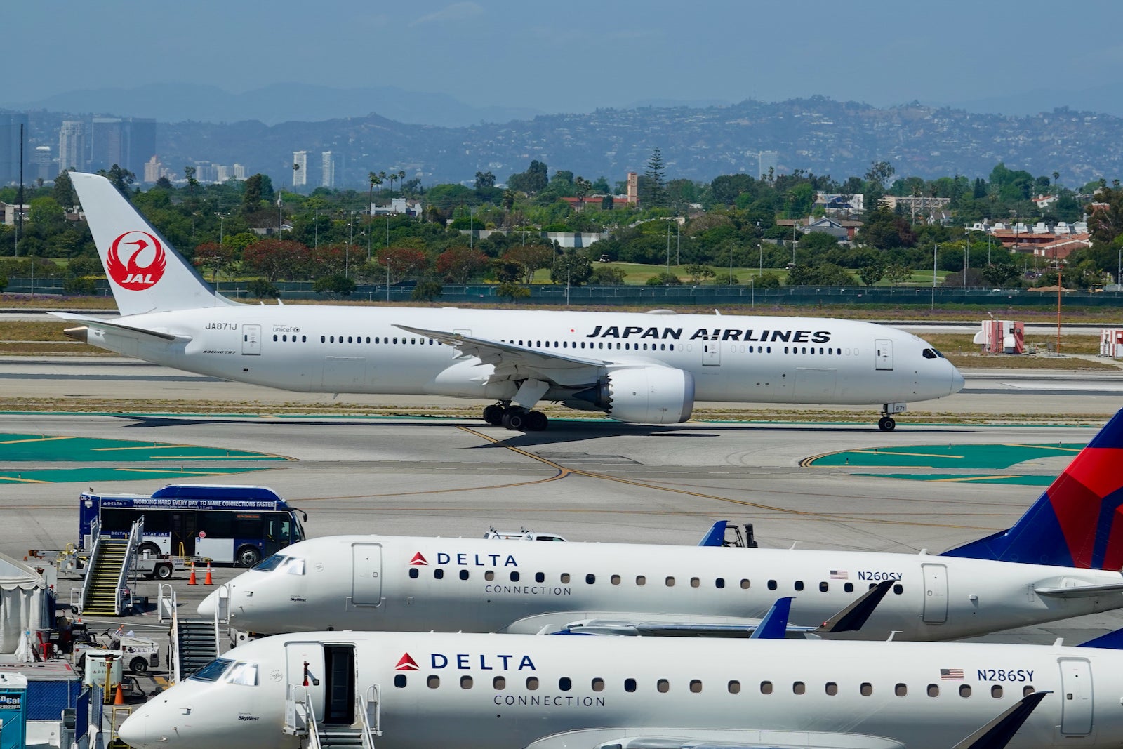 Japan Airlines and Delta Air Lines planes on tarmac