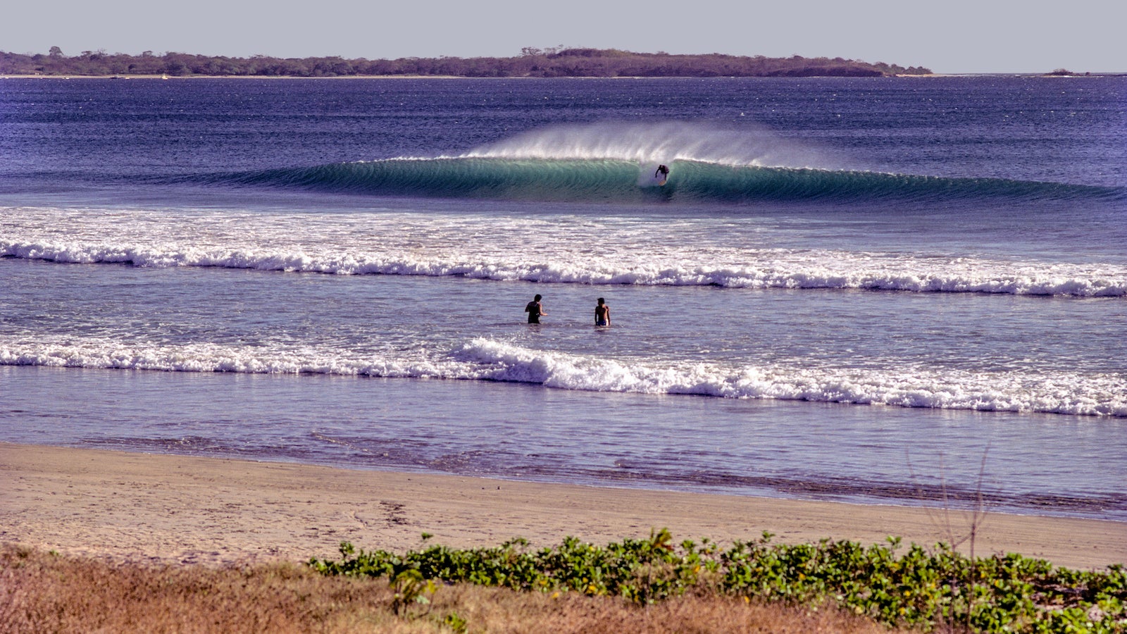 Surfers surfing at Liberia, Costa Rica