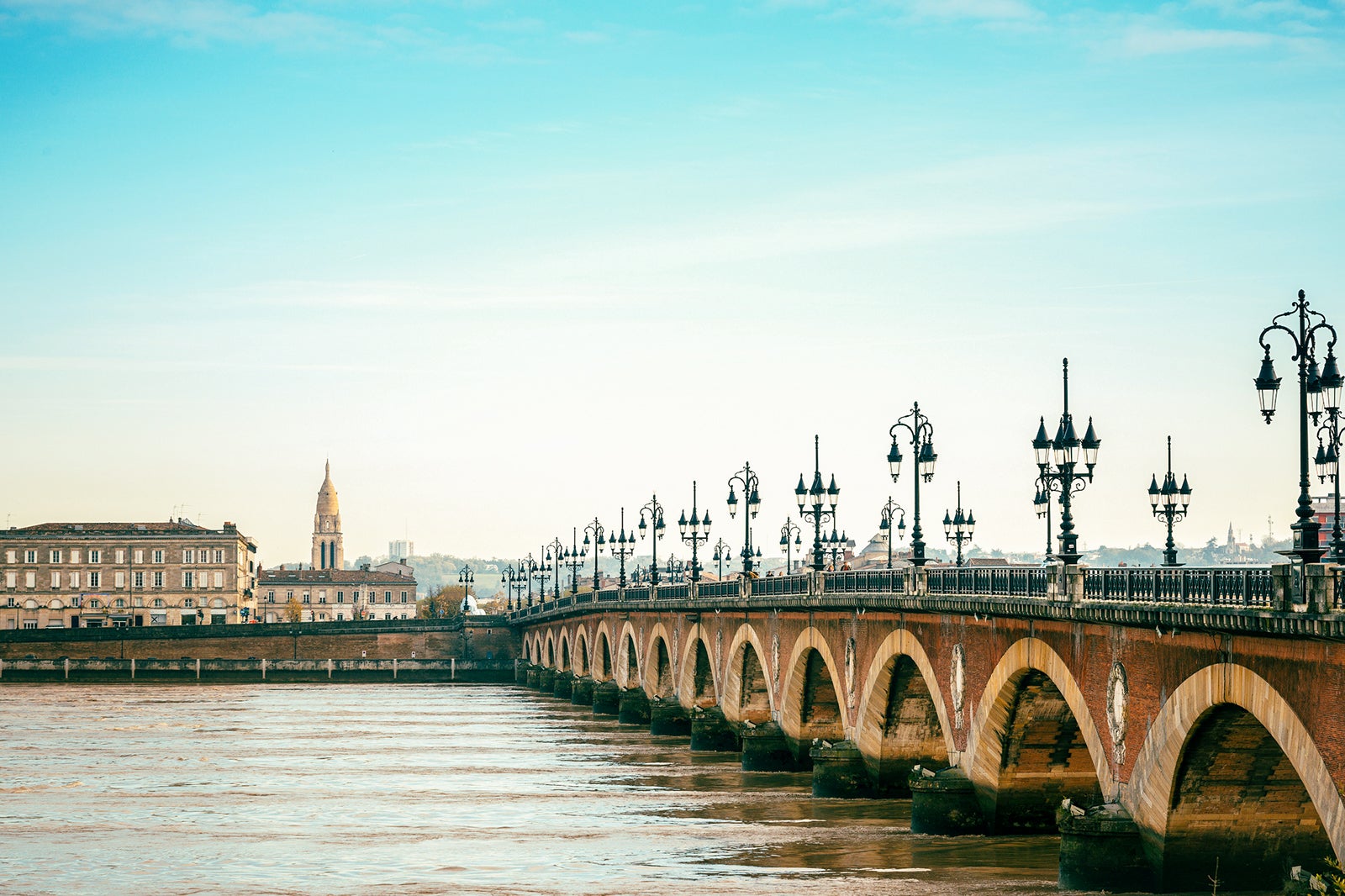 A bridge spans the river in Bordeaux, France