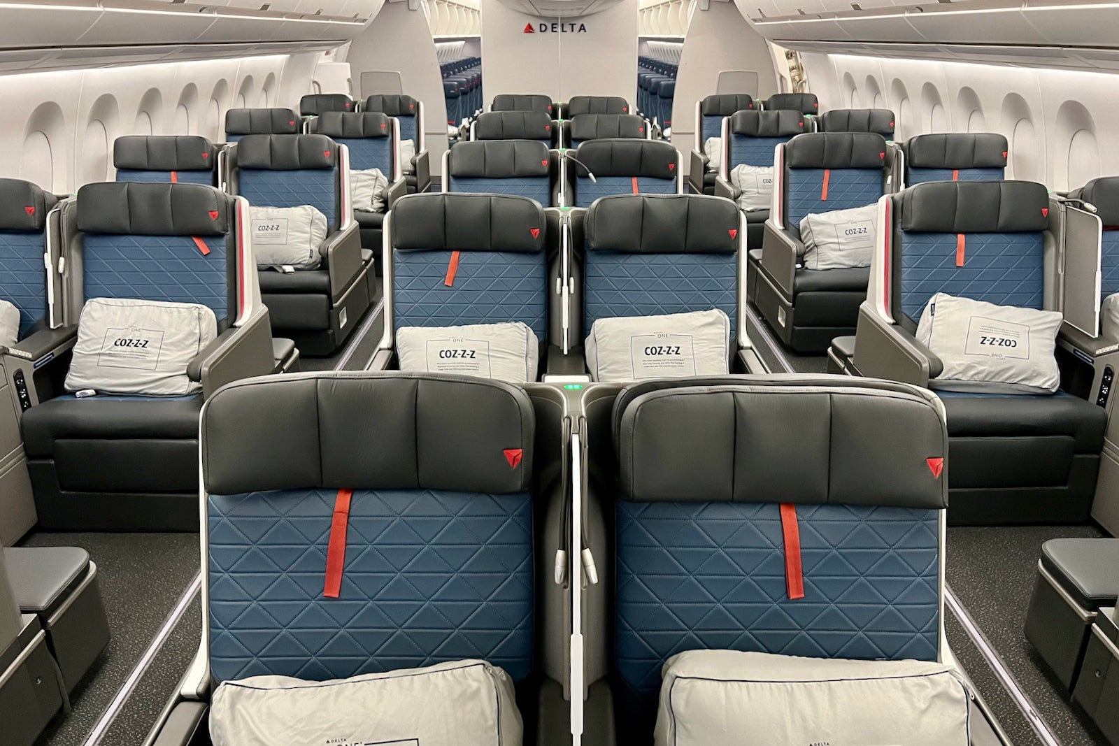 rows of empty Delta business class seats