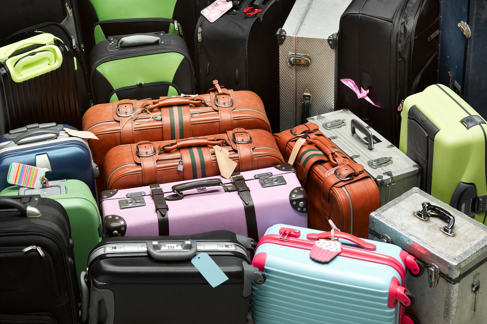 many suitcases in different colors