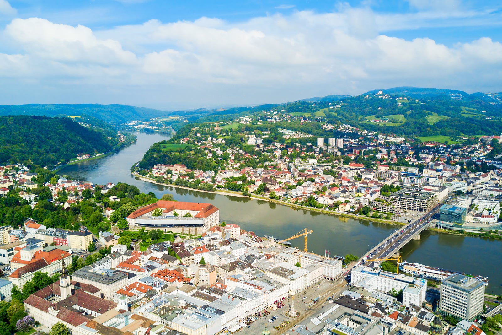 An aerial view of a portion of the Danube River as it runs through Linz