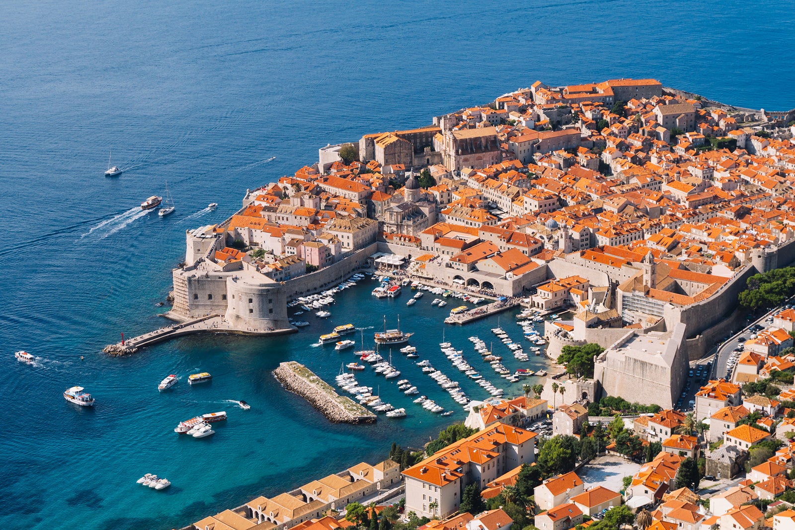 Aerial top view on the old city of Dubrovnik, from the observation deck on the mountain above the city. Film location. The view of the city is based on the Royal Harbor.