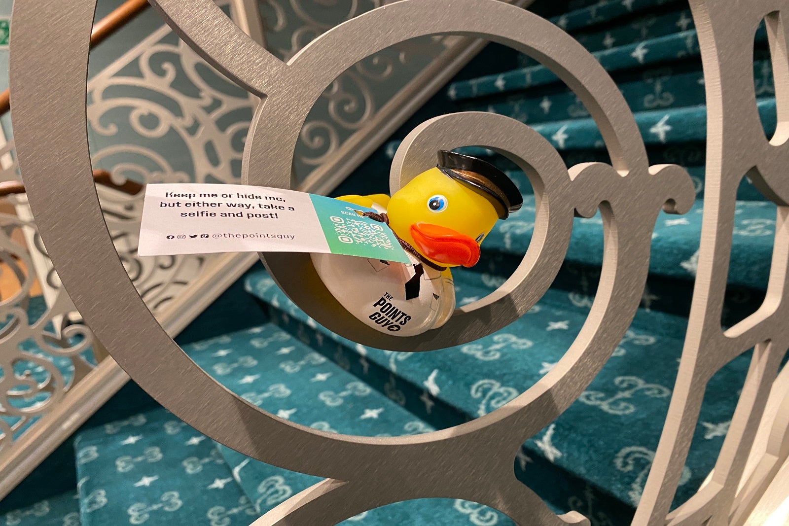 A rubber duck hiding on a stairwell on a cruise ship