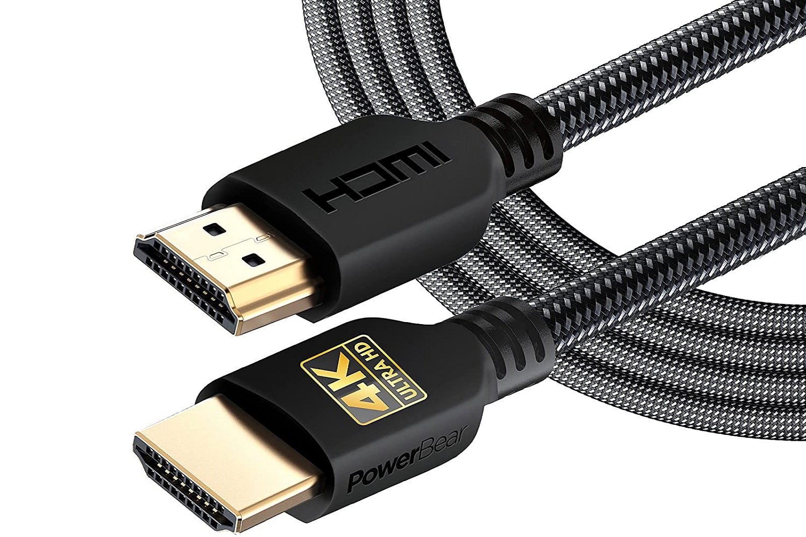 Both ends of an HDMI cable with the black cord in the background