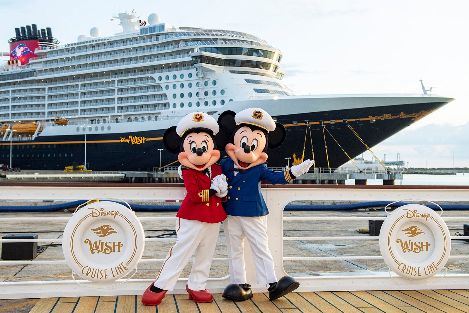 Mickey and Minnie in front of Disney Wish