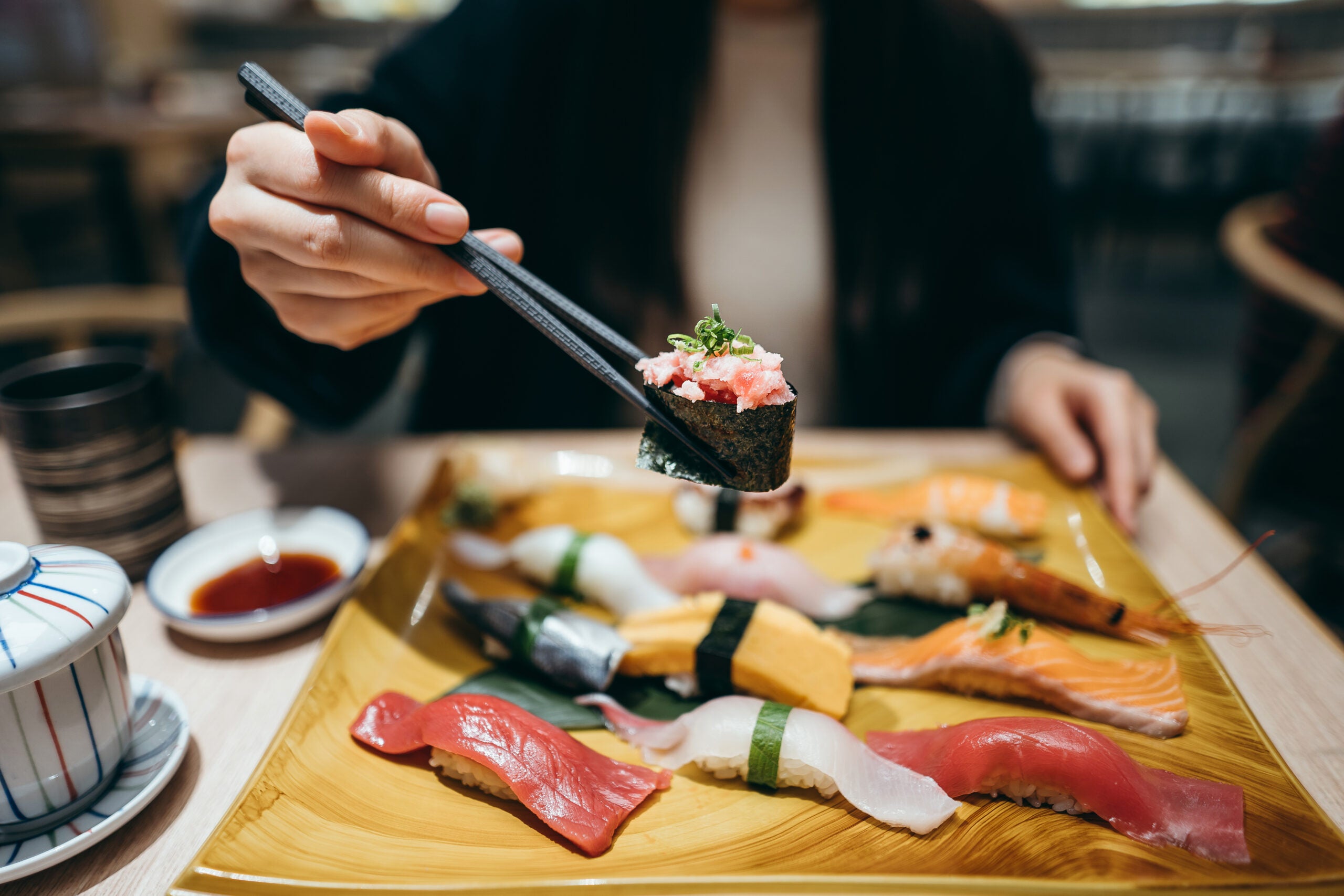 eating sushi at a restaurant