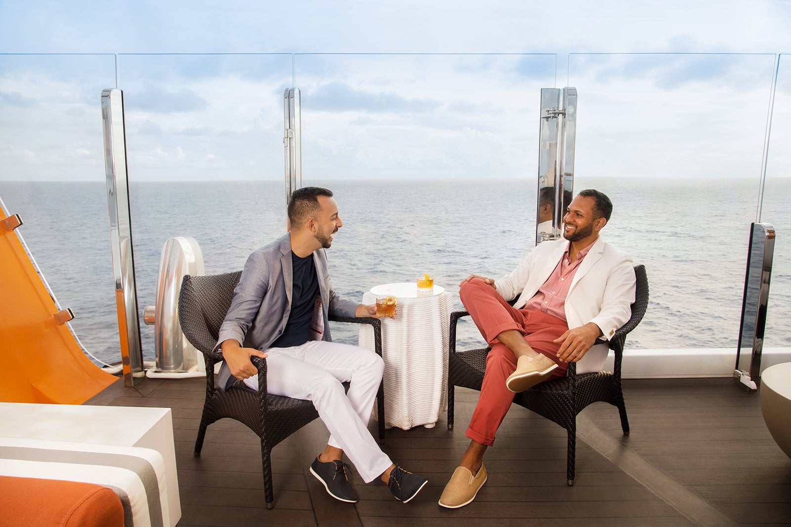 Couple enjoying a drink on cruise ship
