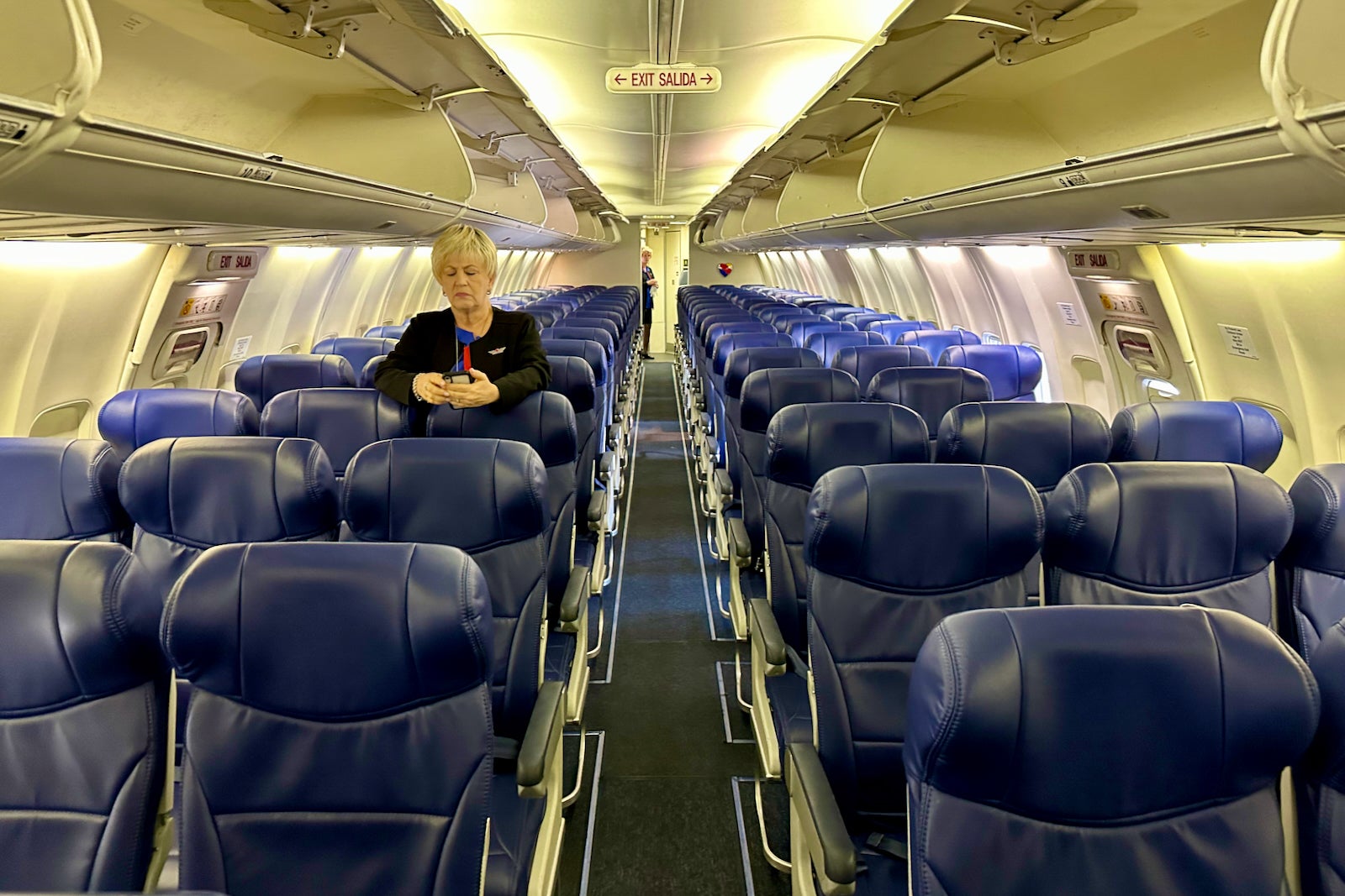 flight attendant waiting inside empty Southwest plane