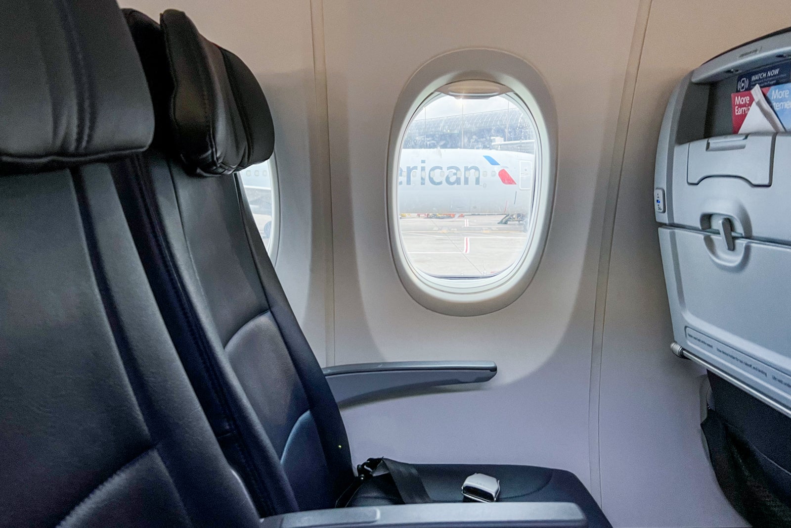 American Airlines plane through window of cabin on American Airlines flight.