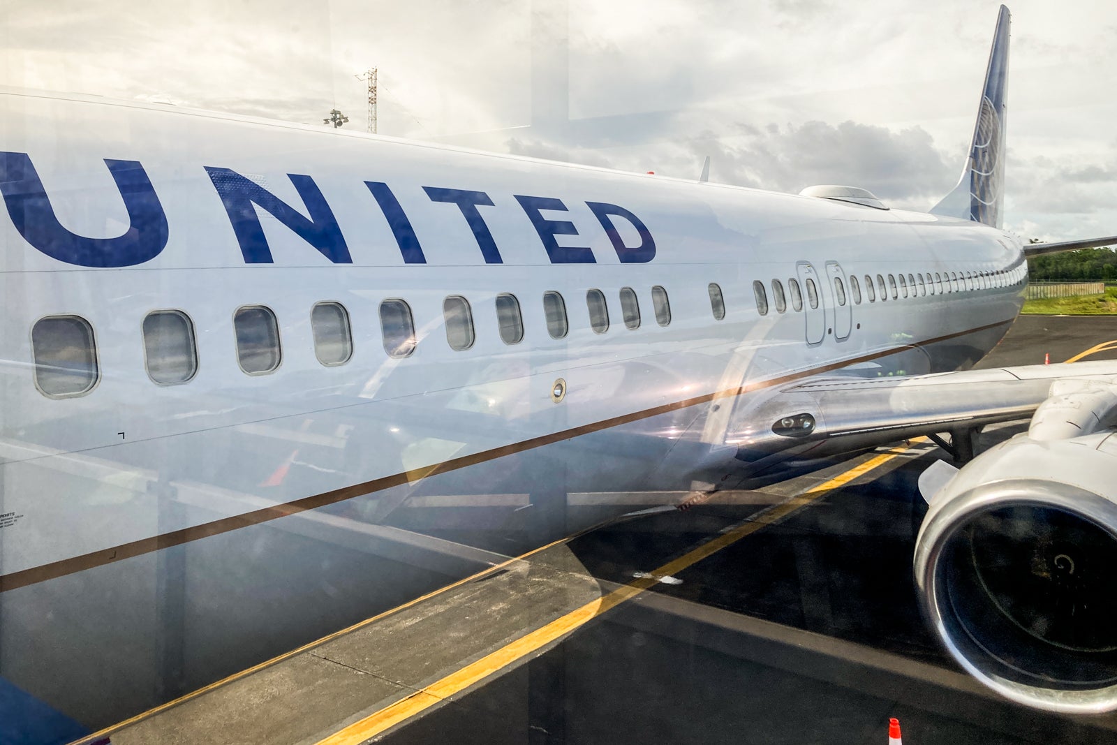 the side of a United Airlines plane showing its logo