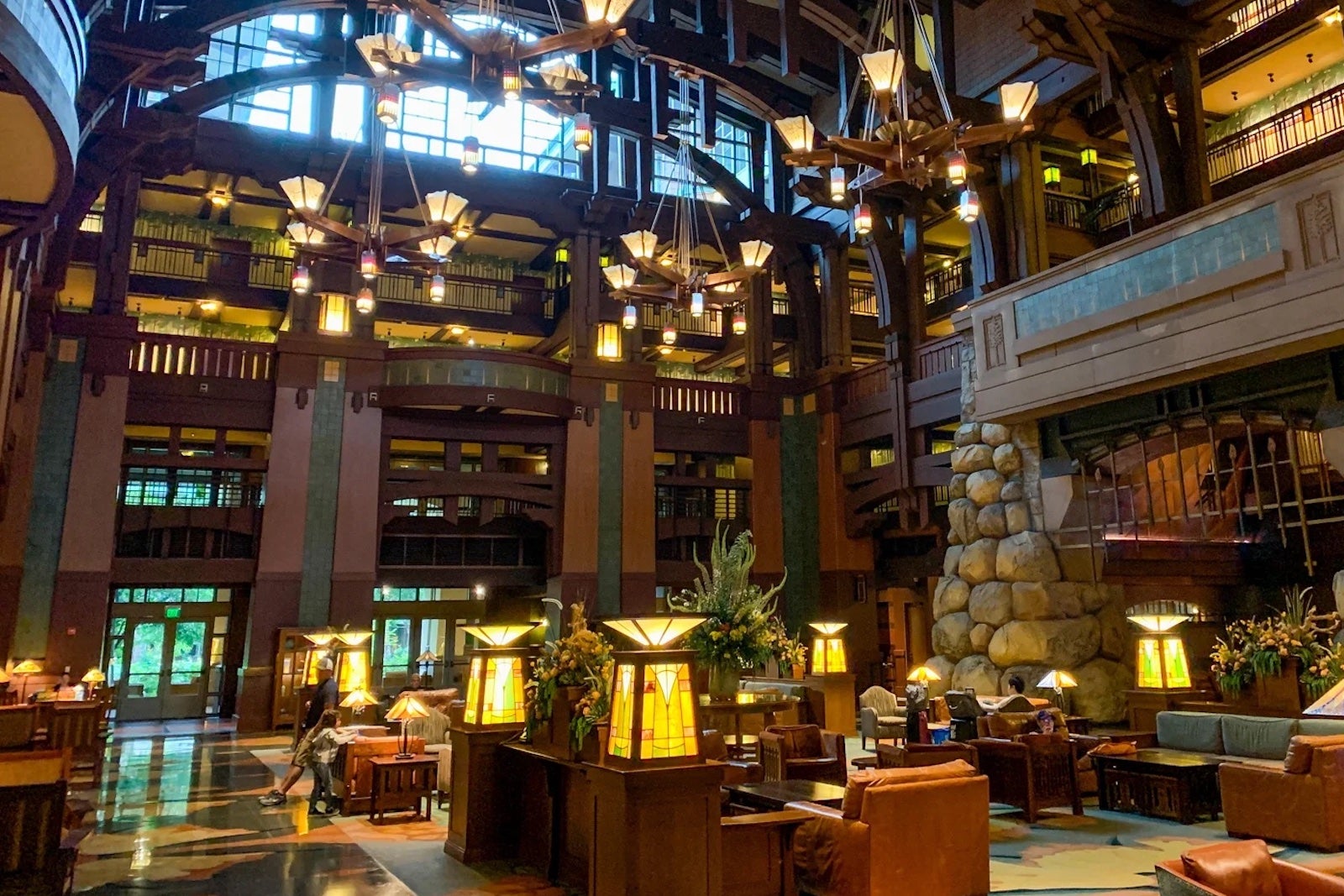 The chandeliers and lamps glow in the lobby of the Grand Californian Hotel & Spa at Disneyland