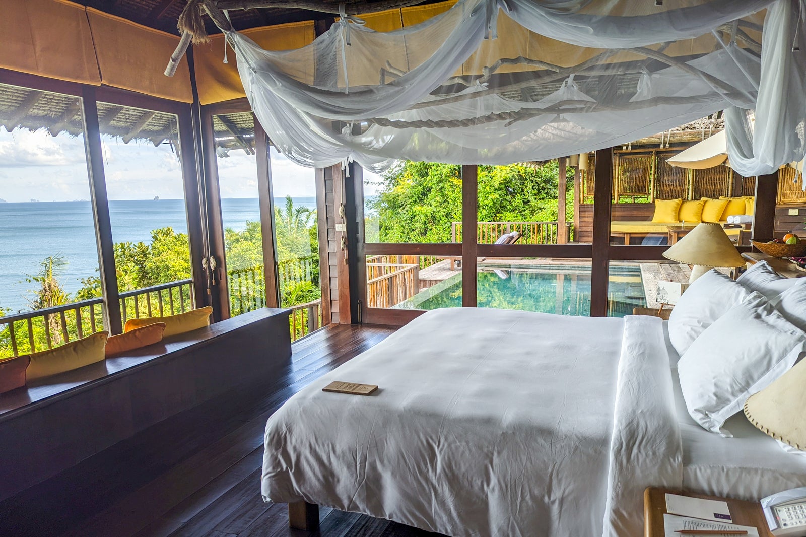 Side view of bed at Six Senses Yao Noi in Thailand. 