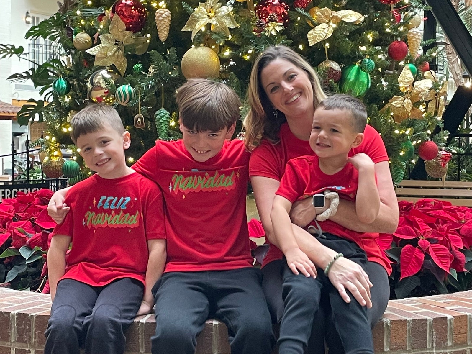 Family in front of a Christmas Tree at a Gaylord Hotel