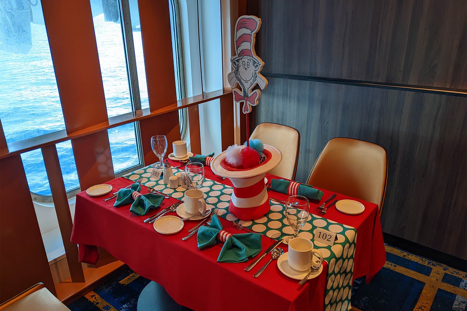 Colorful table setting for Carnival's Dr. Seuss themed breakfast