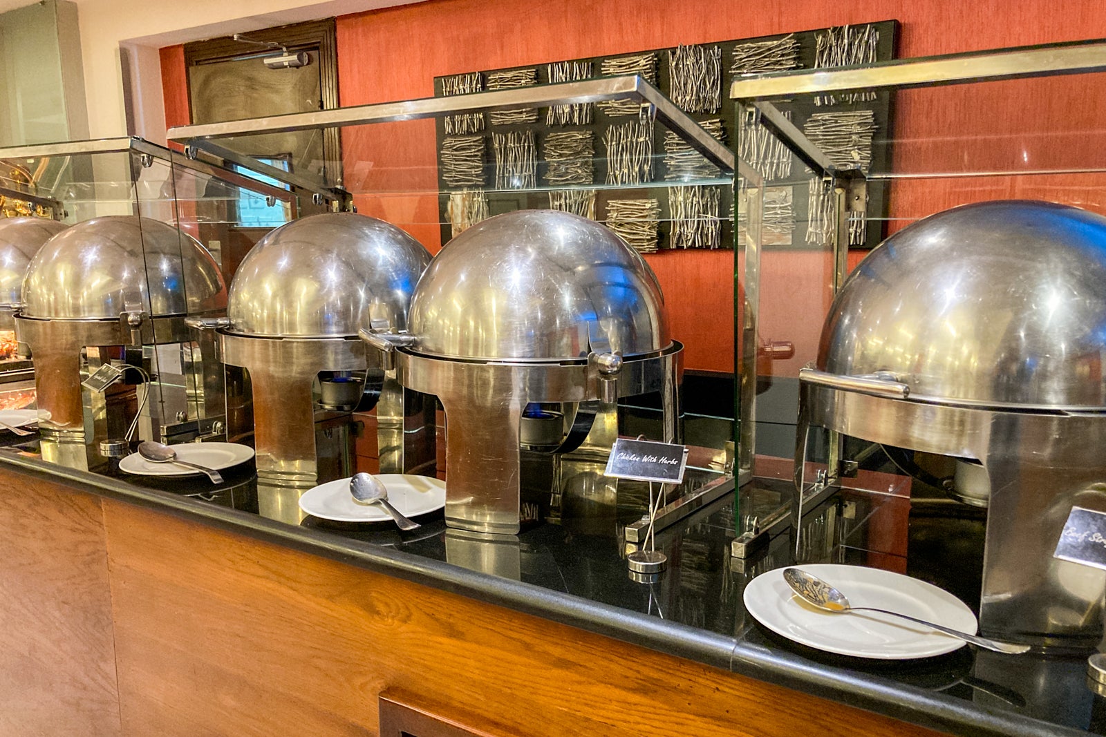 hot food trays on a buffet