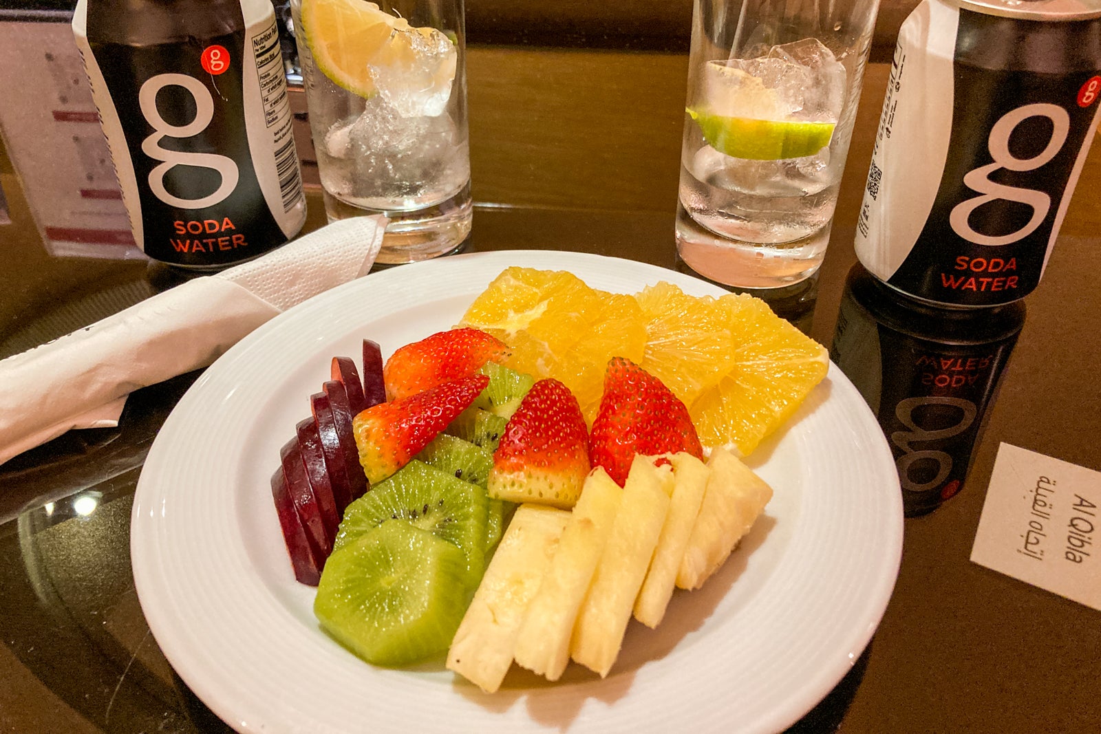 a fruit plate and drinks
