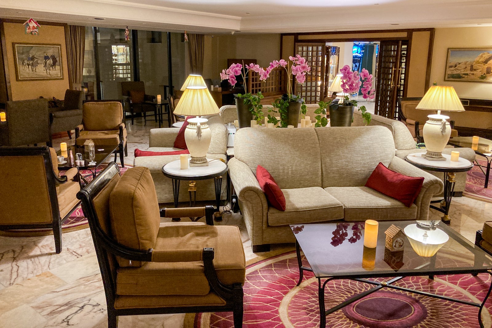 furniture in a seating area near a hotel lobby