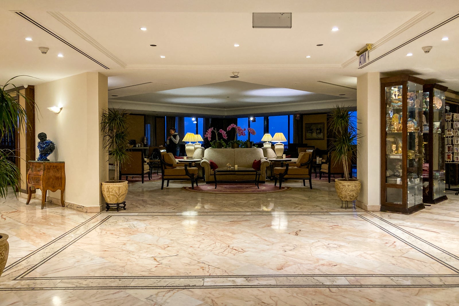 a seating area at a hotel, but the lights are off making it look unusable