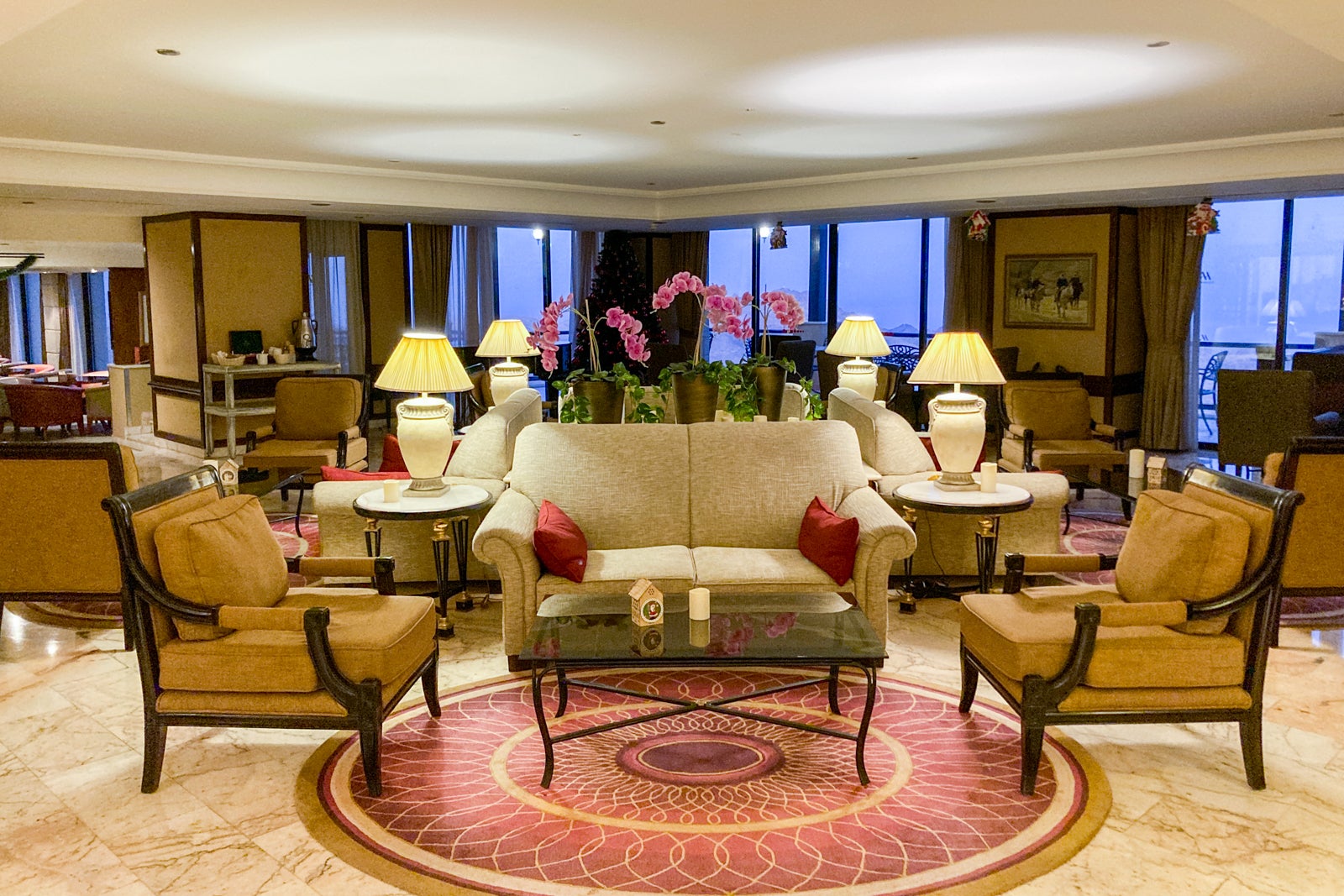 furniture in a seating area near a hotel lobby