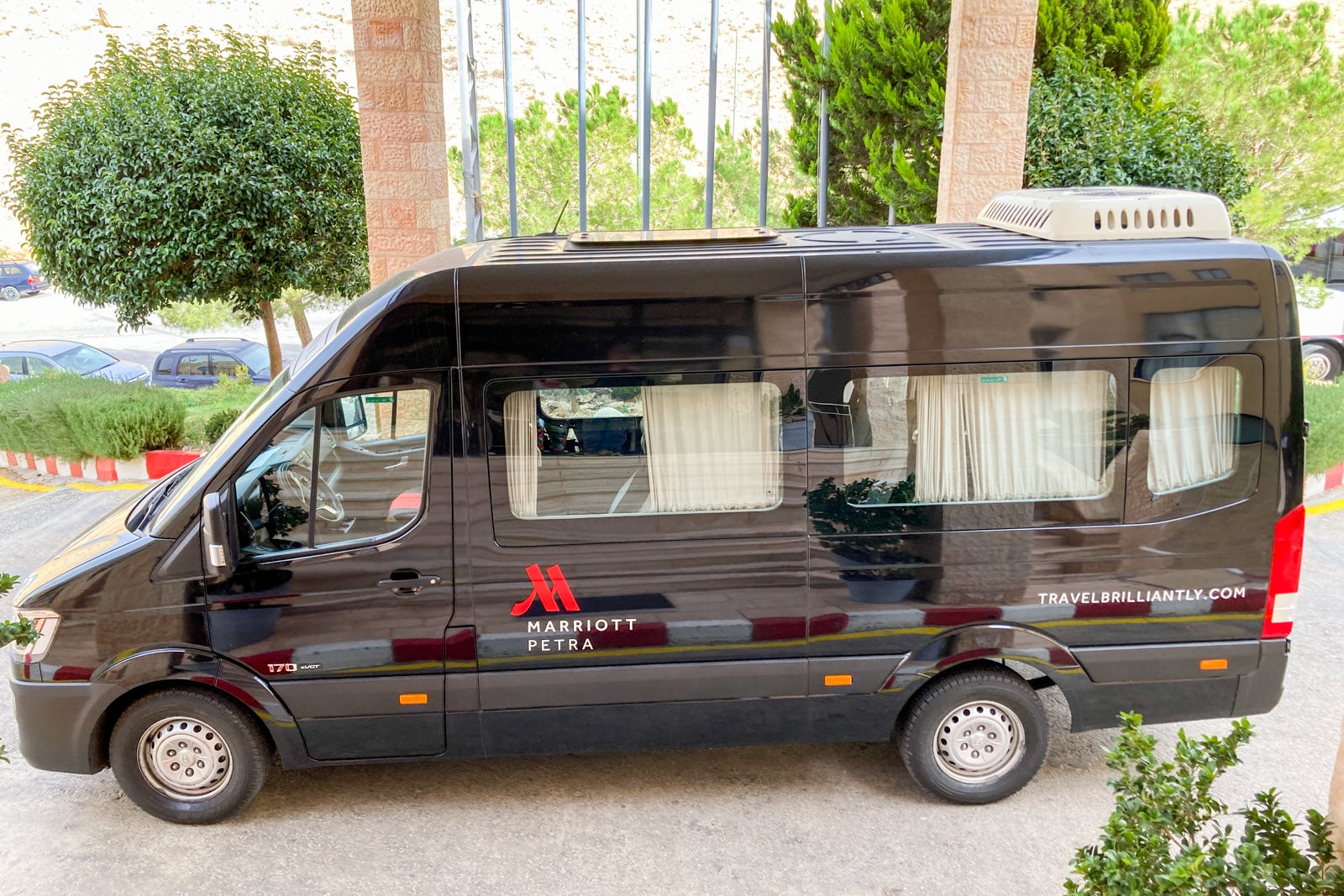 a van with the Marriott logo on the side