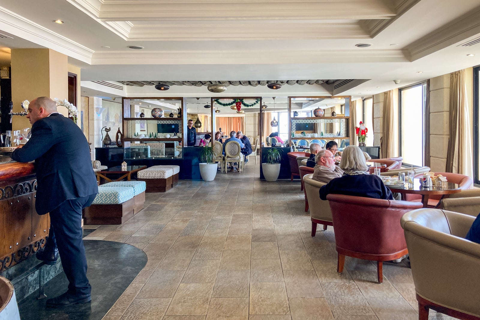 people sit in a hotel bar and café