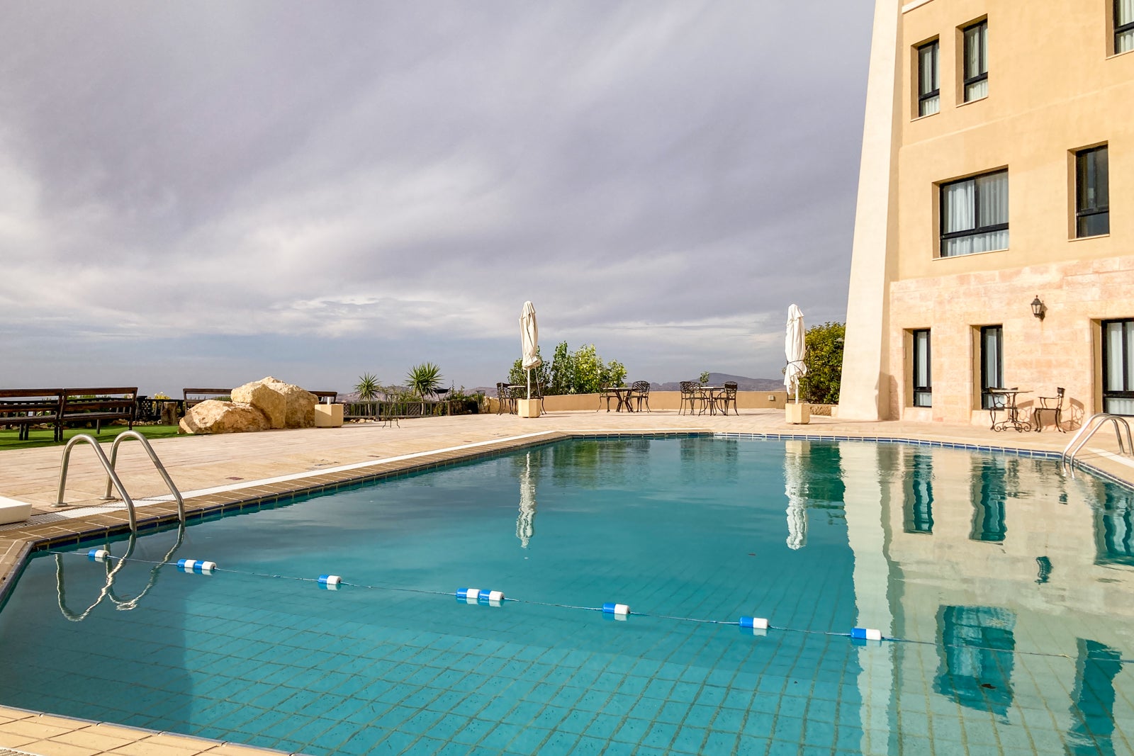 a swimming pool at a hotel in the desert