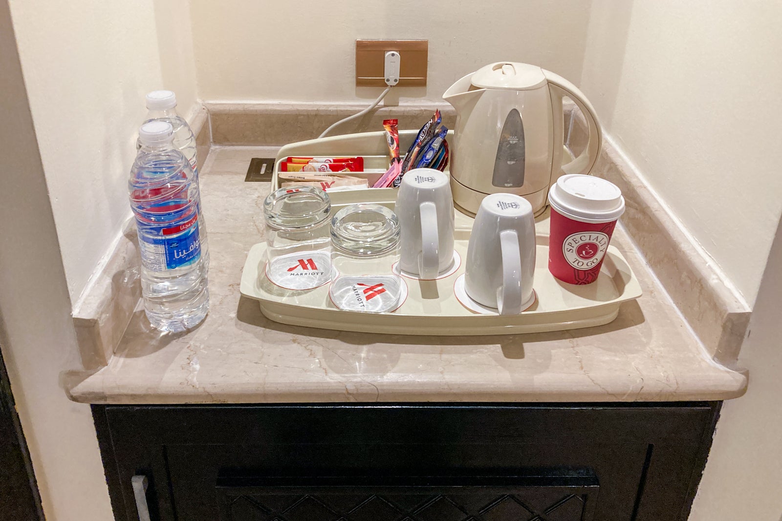 coffee and tea preparation items on a counter