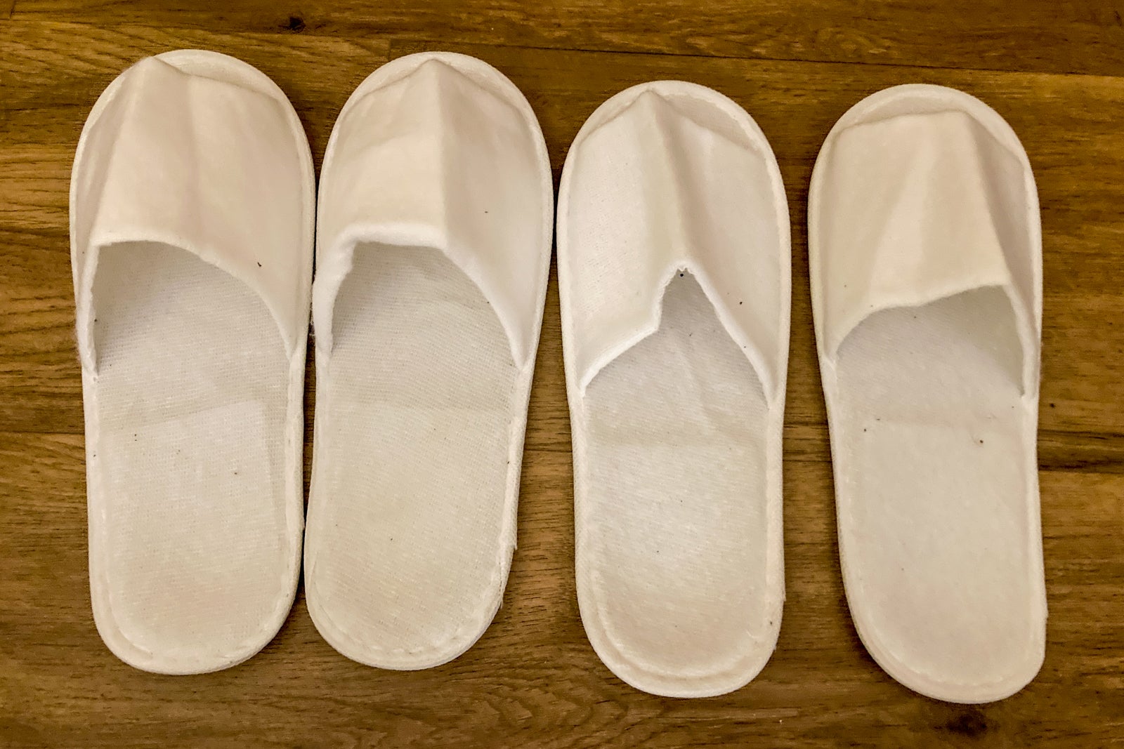4 white fluffy slippers